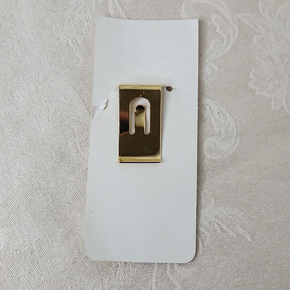 Mirage Las Vegas brass gold money clip $100 simulated poker chip